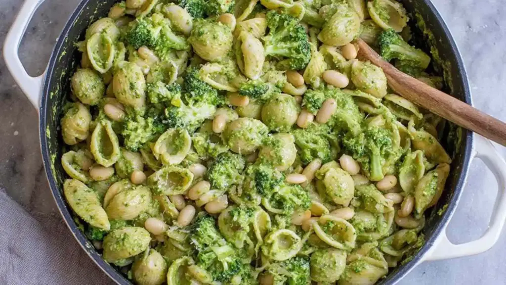 fresh pesto pasta with broccoli and white beans - featured image