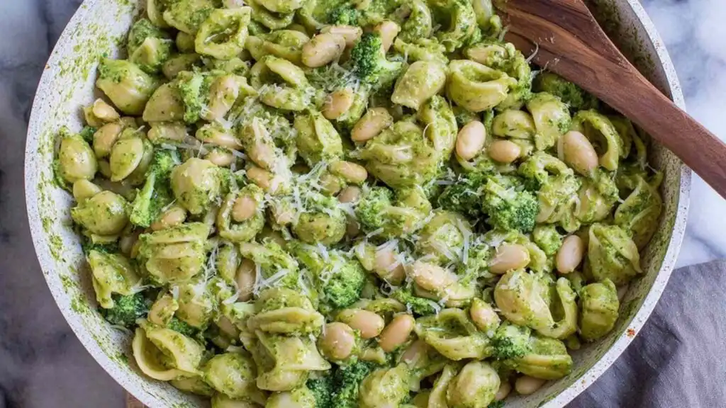 fresh pesto pasta with broccoli and white beans preparation steps