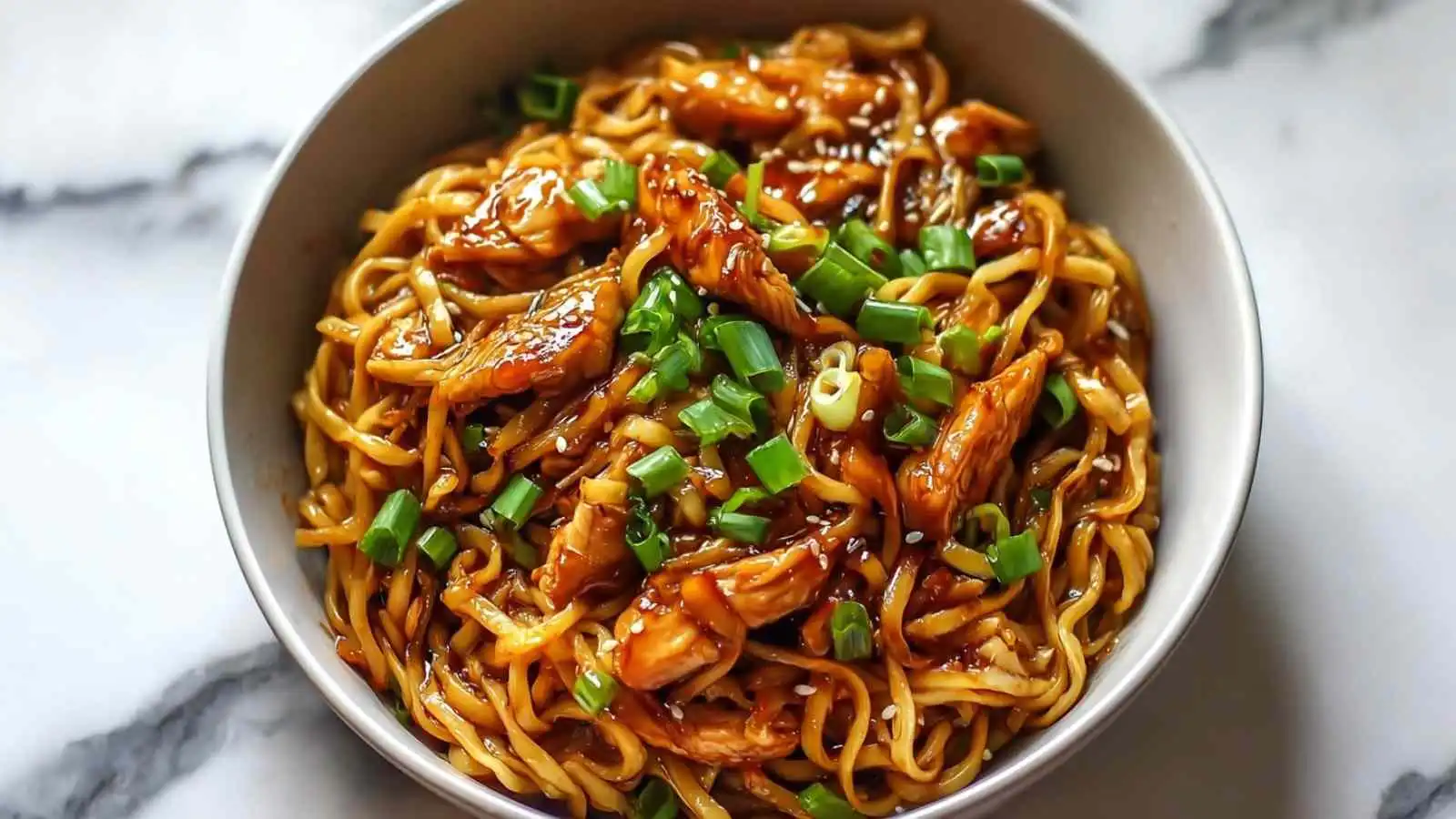high protein sticky garlic chicken noodles - featured image
